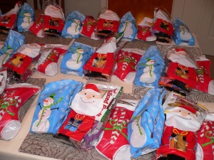 The goodies were sorted and put into gift bags. Each soldier will get three bags of goodies.