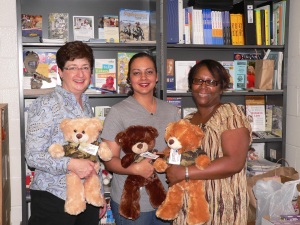 Dorie visits with the Family Readiness Group (FRG) leader and the FRSA.